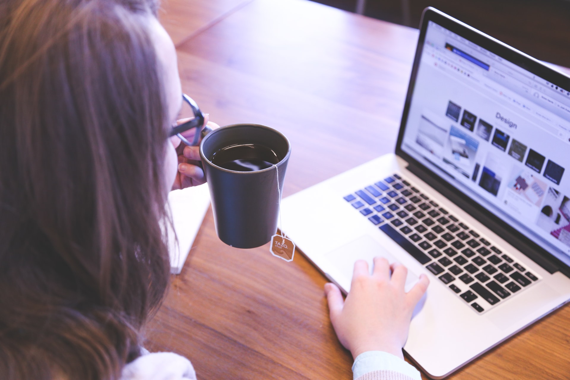 Young lady scrolling through the website