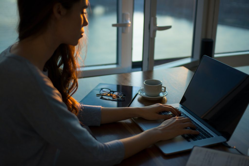 girl using laptop