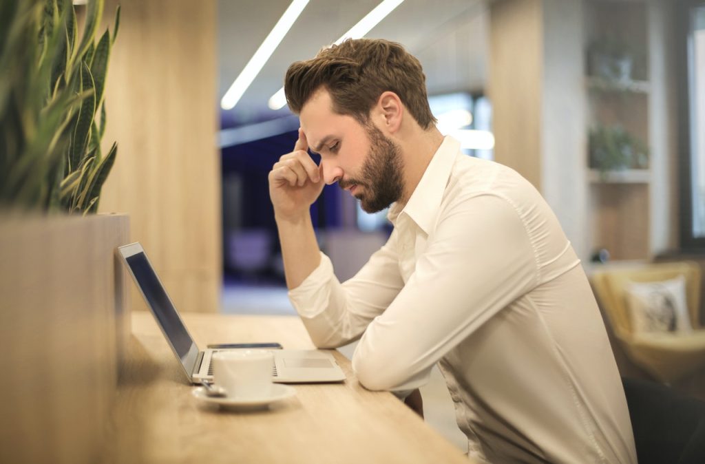 Man looking at laptop